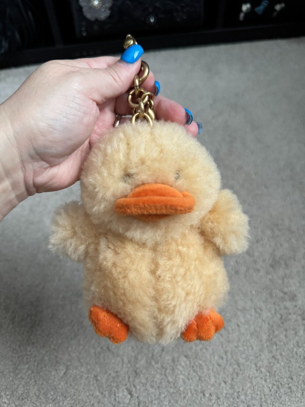 Coach Ducky bag charm in shearling, NWOT, never used